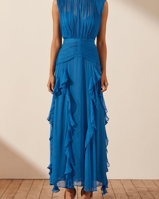 Eileen Pileli Yuvarlak Yaka Volanlı Uzun Elbise